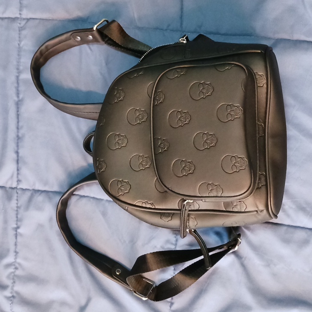 Never used vegan leather Skull black mini back pack bag purse Mad Engine